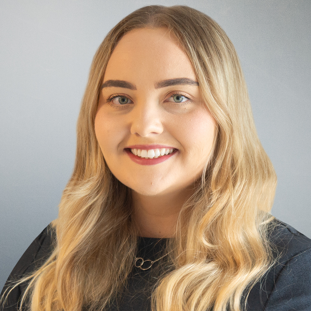A professional headshot of Jessica, a trainee solicitor in the commercial property team.