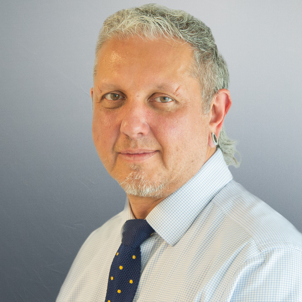 rofessional headshot of Jay Hall, Title Rectification Associate at Flint Bishop.